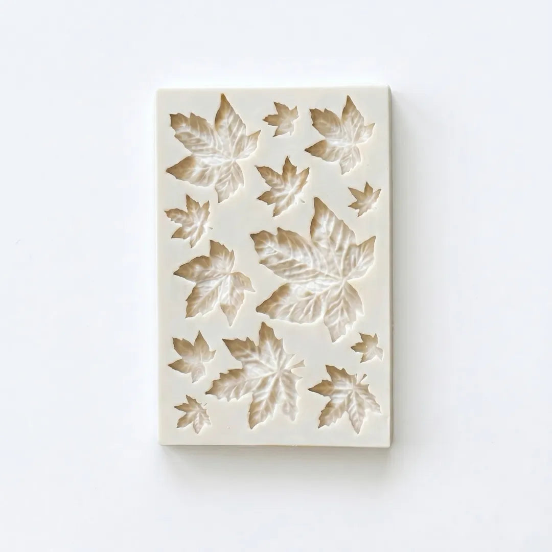 Silicone mould with leaf pattern on a white background