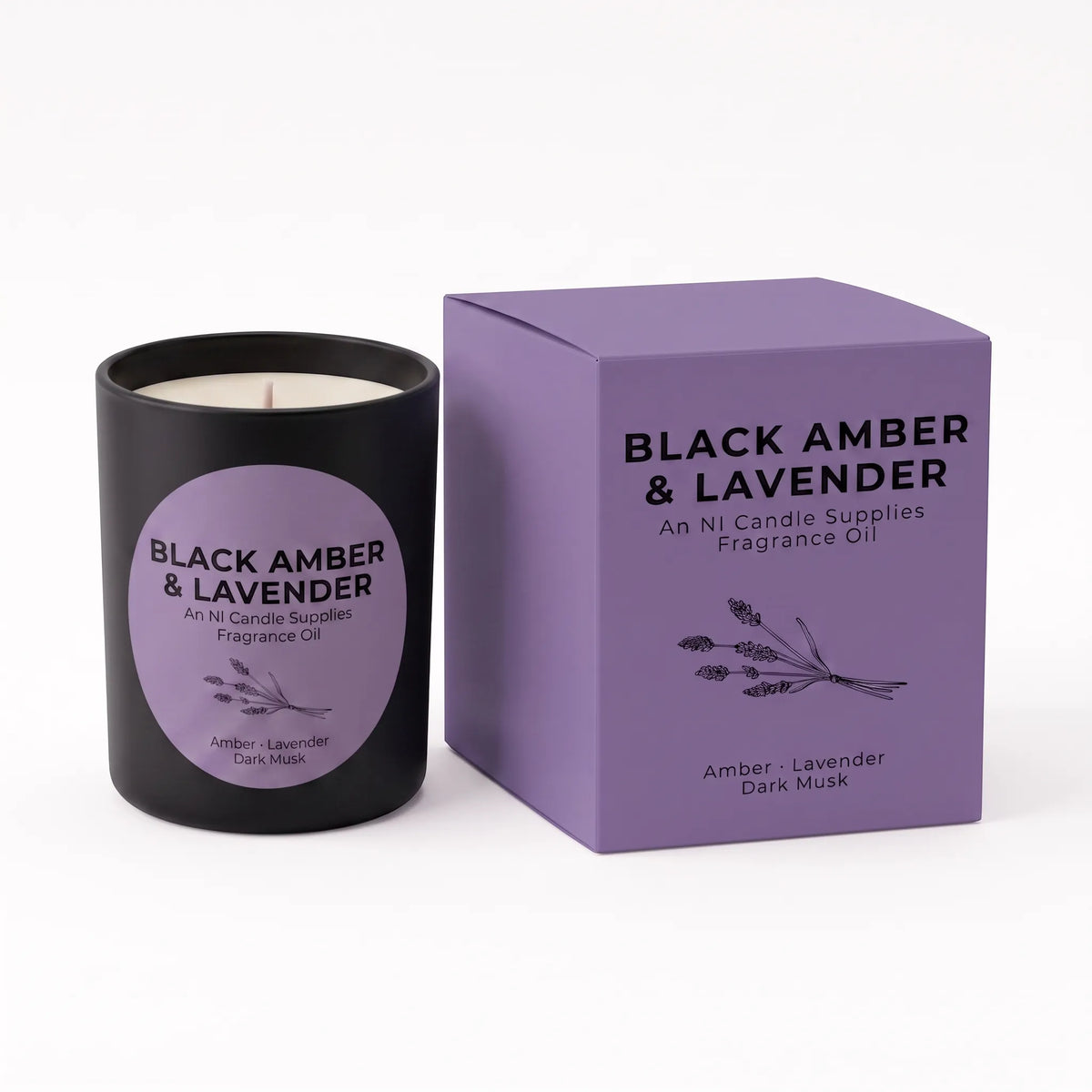 A black glass candle jar with a lavender label next to its matching purple box, labeled 'Black Amber & Lavender' by An N Candle Supplies, on a white background.