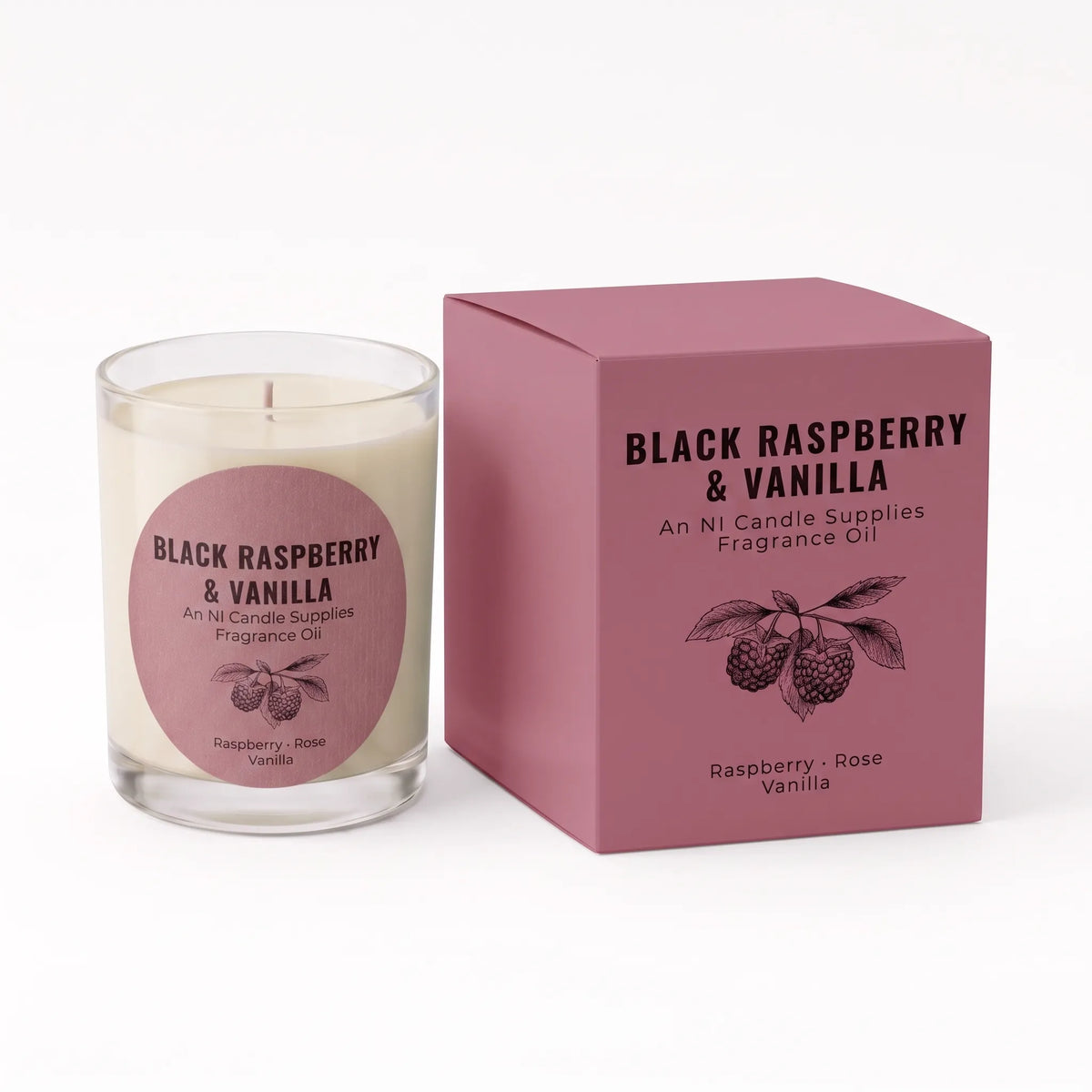 A glass jar candle with cream-colored wax and a pink circular label next to its matching dusty pink packaging box. The labels and box are printed with 'BLACK RASPBERRY & VANILLA' and 'An Ni Candle Supplies Fragrance Oil' along with a raspberry illustration.
