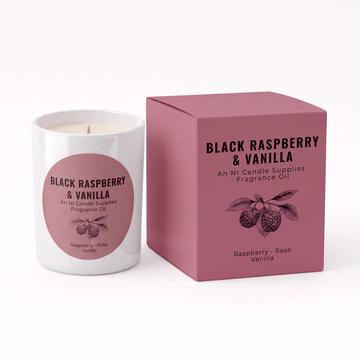 A white glass candle jar with a pink circular label next to its matching pink box, labeled 'Black Raspberry & Vanilla' by An Ni Candle Supplies.