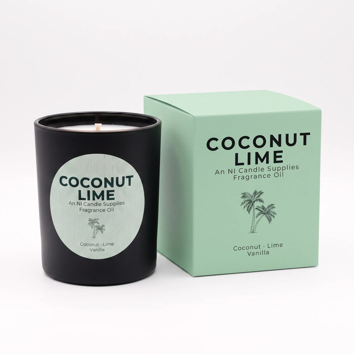 A black candle jar with a round white label reading 'COCONUT LIME' stands next to its mint green product box on a clean white background.