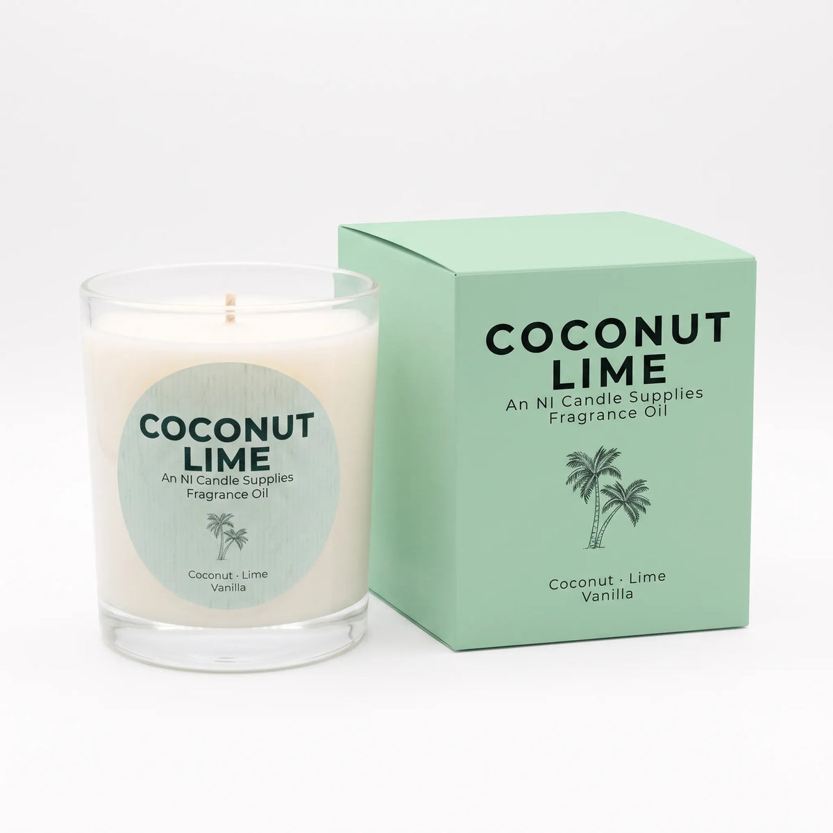 A coconut lime fragrance oil candle in a clear glass jar next to its mint green packaging box, both featuring the brand name An Ni Candle Supplies and the scent name Coconut Lime.