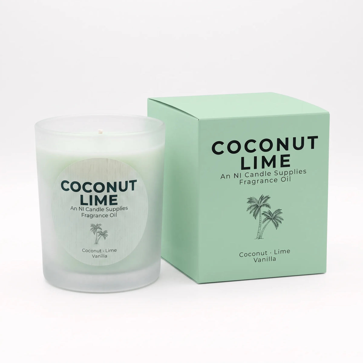 A coconut lime fragrance oil candle in a frosted glass jar next to its mint green packaging box, both featuring black text and a palm tree illustration on a clean white background.