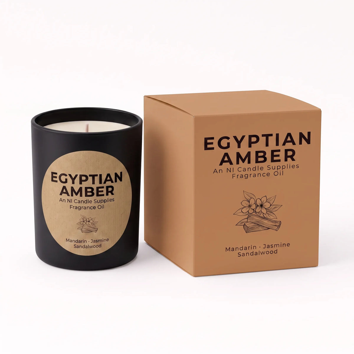 A black glass candle jar with a beige circular label next to its matching brown cardboard box, both printed with the text 'EGYPTIAN AMBER' and 'Mandarin - Jasmine Sandalwood'.