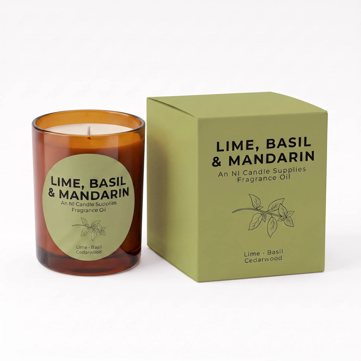 An amber glass candle jar with a round olive-green label next to its matching square olive-green box, both labeled 'LIME, BASIL & MANDARIN' fragrance oil by Ni Candle Supplies, on a white background.
