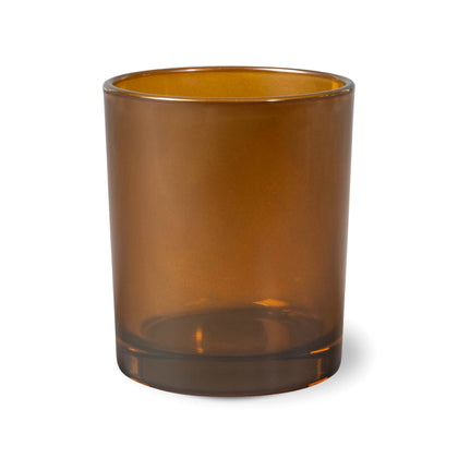 Brown glass tumbler on a white background