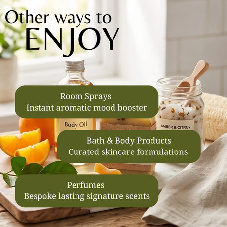 Promotional graphic with the headline 'Other ways to ENJOY' over a styled tabletop scene showing a bottle of body oil, a jar of bath/body product, citrus slices, leaves, and a cloth. Three dark olive text boxes list: Room Sprays, Instant aromatic mood booster; Bath & Body Products, Curated skincare formulations; Perfumes, Bespoke lasting signature scents.