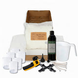 Collection of items including a bag labelled 'SoyaLuna', bottles, measuring cups, and tools on a white background.