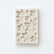 Silicone mould with leaf pattern on a white background