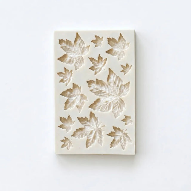 Silicone mould with leaf pattern on a white background