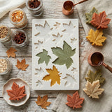 Maple leaf silicone mould with autumn-themed wax melts on a rustic wooden surface.