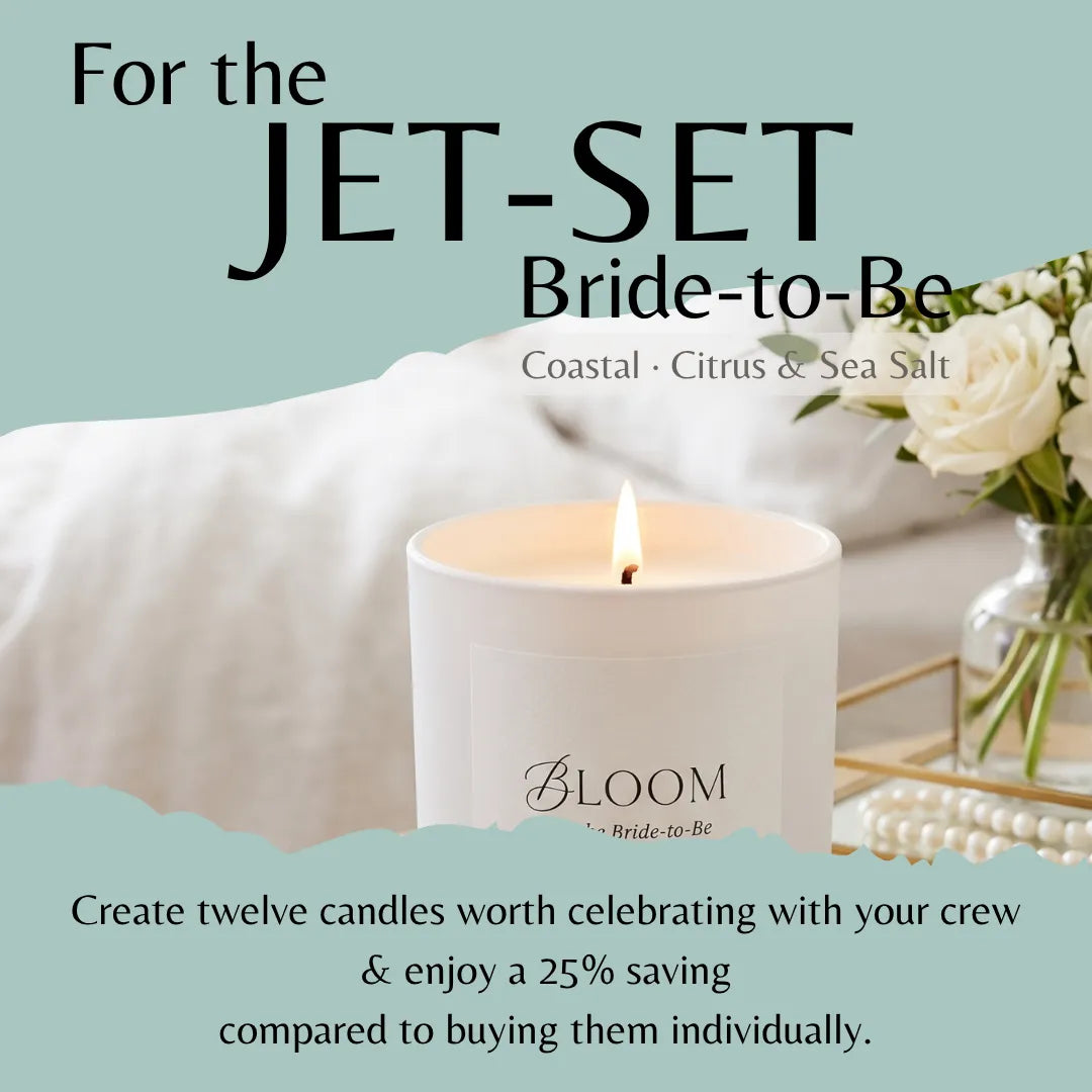 A lit white jar candle labeled BLOOM Bride-to-Be is shown in a styled setting with white bedding, white flowers, and pearl beads. Text reads 'For the JET-SET Bride-to-Be' and 'Coastal · Citrus & Sea Salt,' with a promotional note about twelve candles and 25% savings.