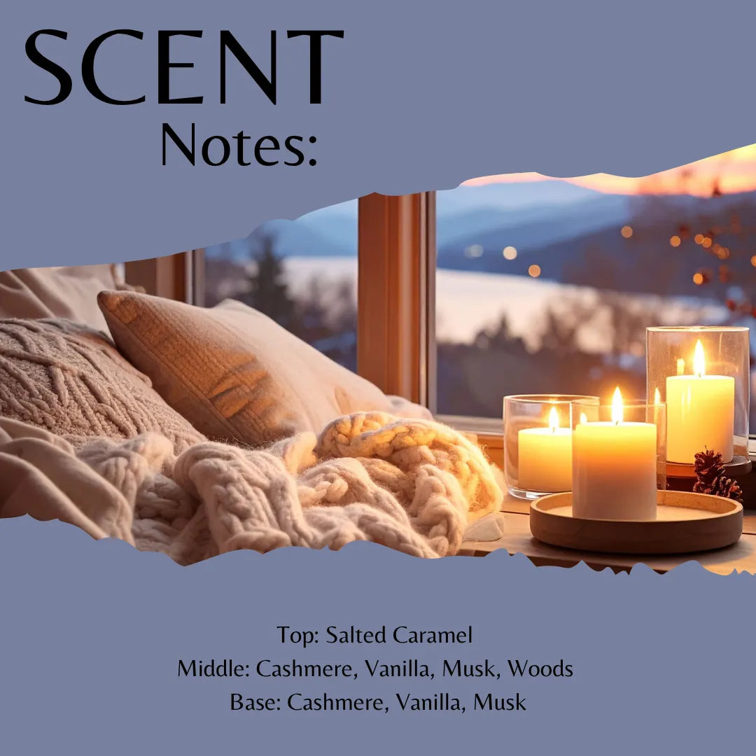 Scent profile graphic for a candle, titled 'SCENT Notes:' with a warm cozy scene of lit candles, pillows, and a knitted blanket in front of a window. Text lists the fragrance notes: Top: Salted Caramel, Middle: Cashmere, Vanilla, Musk, Woods, and Base: Cashmere, Vanilla, Musk.
