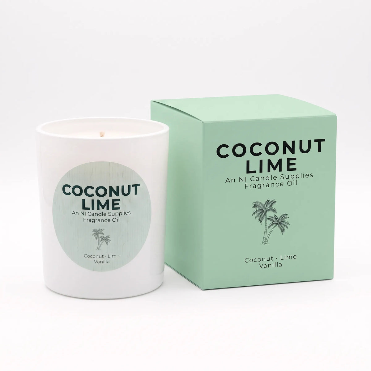 A white candle jar with a round light green label next to its mint green packaging box, both printed with the text 'COCONUT LIME' and 'Coconut-Lime Vanilla' with a small palm tree illustration.