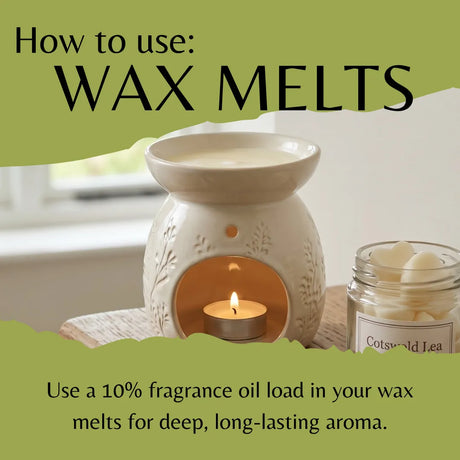 Wax melt burner with lit candle and jar of wax melts on a light background