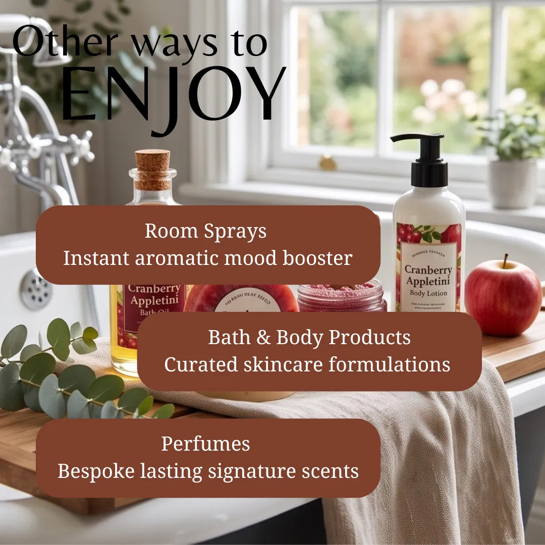 A promotional graphic for a wellness or spa product collection, featuring a bathroom setting with a bathtub, window, and decorative props. Visible products include a Cranberry Appleton room spray bottle, a bath and body lotion bottle, and a small jar, overlaid with text reading 'Other ways to ENJOY' and categories: 'Room Sprays,' 'Bath & Body Products,' and 'Perfumes.