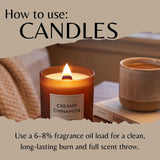 Instructional graphic titled 'How to use: CANDLES' showing a lit amber glass candle labeled 'Creamy Cinnamon' on a table beside a mug and book, with text about fragrance oil load and burning.