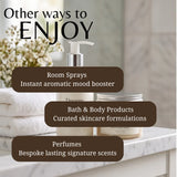 Promotional graphic showing bathroom-themed products including a pump bottle, a jar, and folded towels with overlaid text reading 'Other ways to ENJOY' and bullet points for room sprays, bath & body products, and perfumes.