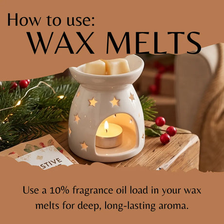 A ceramic wax warmer with star cutouts and a lit tealight candle, shown on a wooden surface with pine branches, red berries, and text reading 'How to use: WAX MELTS' and 'Use a 10% fragrance oil load in your wax melts for deep, long-lasting aroma.'.