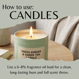 A lit candle in a pale green metal tin sits on a wooden table in a cozy indoor setting, with large text reading 'How to use: CANDLES' and smaller text about fragrance oil load and scent throw.