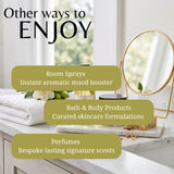 Promotional graphic with the text 'Other ways to ENJOY' over a bathroom counter scene. Three olive-green rounded text boxes list: Room Sprays, Bath & Body Products, and Perfumes.