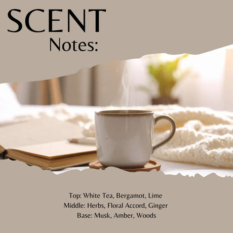 Scent Notes graphic featuring a steaming ceramic mug on a wooden coaster next to an open book and a knitted blanket in a softly lit room. Text at the top reads 'SCENT Notes:' and the bottom lists fragrance notes: White Tea, Bergamot, Lime; Herbs, Floral Accord, Ginger; Musk, Amber, Woods.
