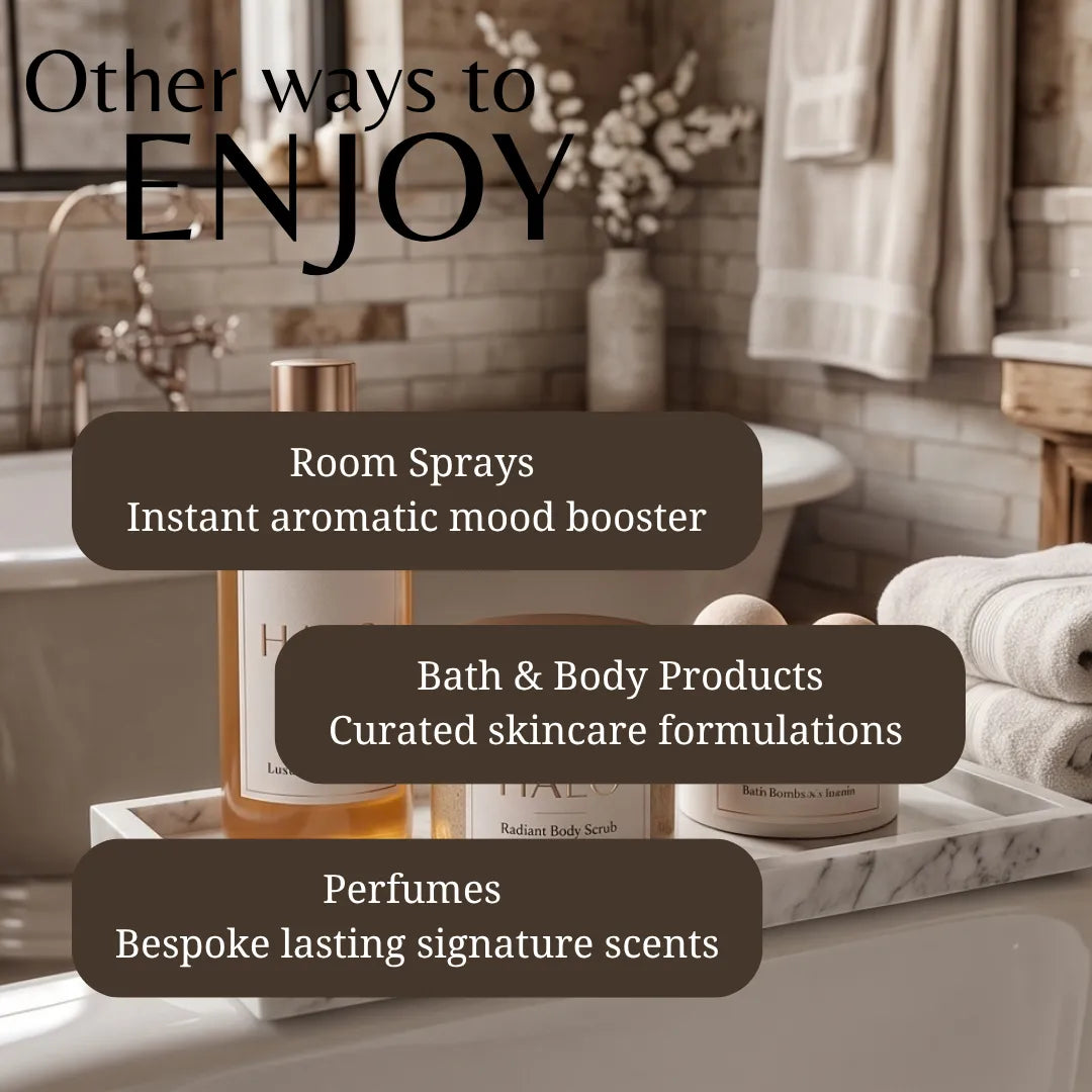 Promotional graphic for home fragrance and bath products, showing a bathroom scene with a tray holding several bottles and jars. Large text reads 'Other ways to ENJOY' with three dark brown callout boxes listing 'Room Sprays', 'Bath & Body Products', and 'Perfumes'.