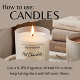 Instructional graphic titled 'How to use: CANDLES' showing a lit COSY NIGHTS Hot Chocolate candle in a glass jar, with stacked books and a mug in the background and text explaining fragrance oil load for a clean burn.