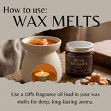 An instructional graphic titled 'How to use: WAX MELTS' shows a beige wax warmer with a lit tealight candle, a jar labeled 'Irish Whiskey Wax Melts,' and several heart-shaped wax melts on a rustic wooden surface.