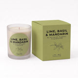 A litless fragrance oil candle in a frosted glass jar next to its olive green packaging box, labeled 'LIME, BASIL & MANDARIN' by Ni Candle Supplies.