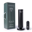 Black aroma diffuser with remote control and packaging on a white background