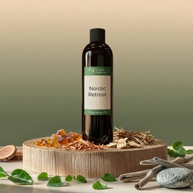 Bottle of 'Nordic Retreat' fragrance oil on a wooden platform with natural elements.