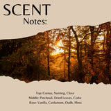 Scent Notes: cover graphic featuring a forest scene with autumn trees and warm sunlight, with text listing fragrance notes including corn, nutmeg, clove, patchouli, dried leaves, cedar, vanilla, cardamom, oudh, and moss.