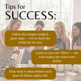 Promotional graphic with the headline 'Tips for SUCCESS:' over a softly blurred photo of four women in a bright kitchen. Three olive-brown text boxes give tips about weighing and pouring steps, curing time, and trimming the wick.