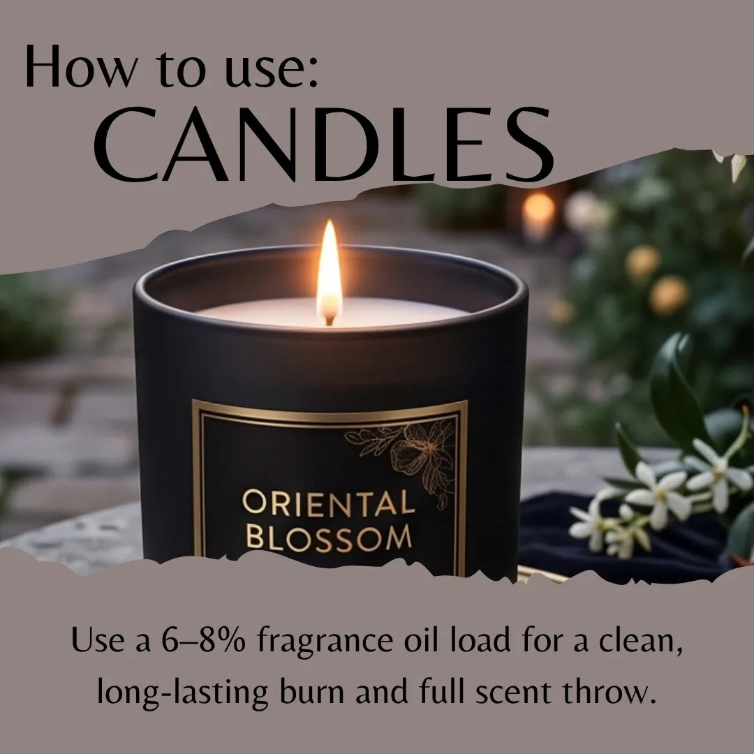 A lit black scented candle labeled 'ORIENTAL BLOSSOM' with text reading 'How to use: CANDLES' and usage instructions below, set against a softly blurred outdoor background with greenery and flowers.
