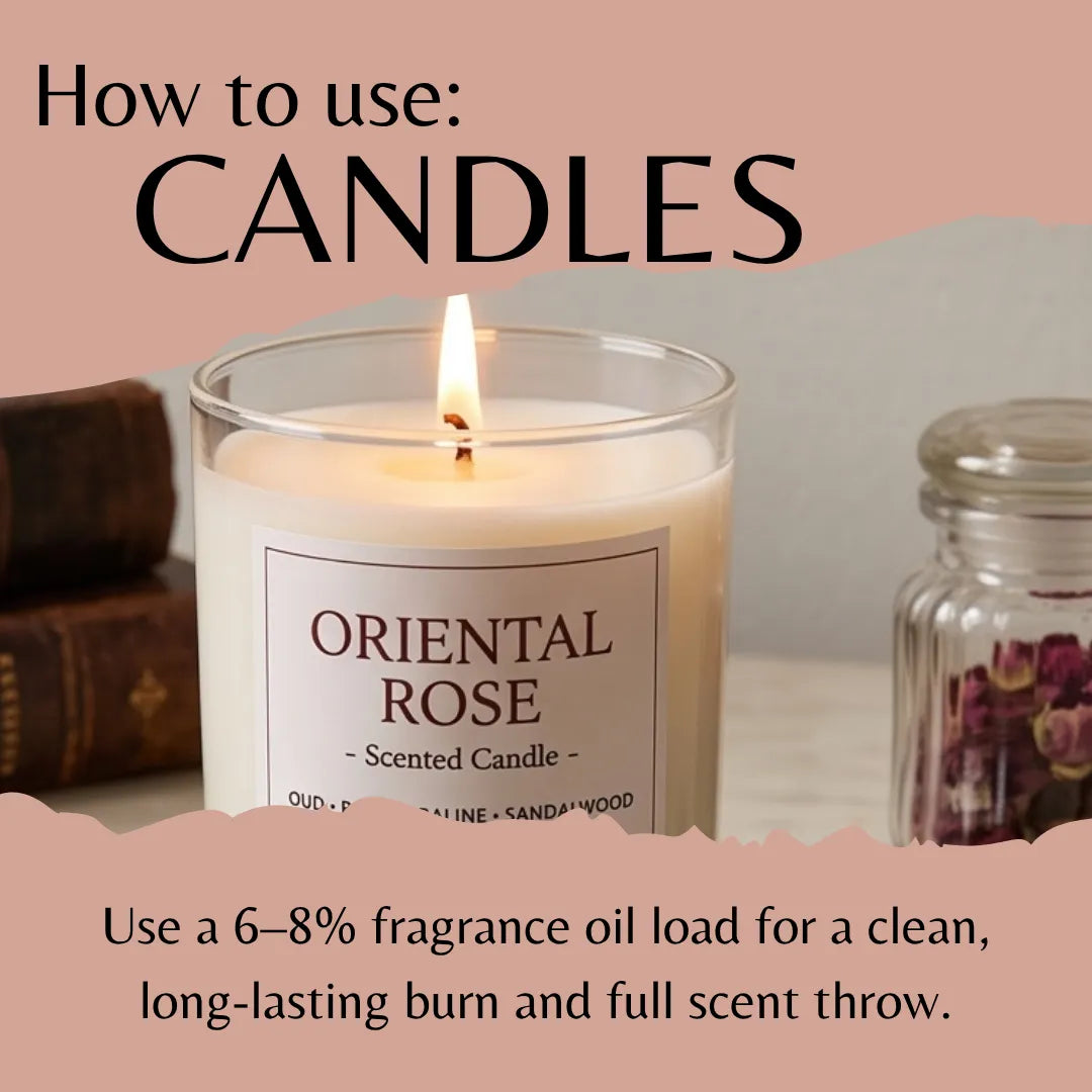 A lit scented candle in a clear glass jar labeled 'ORIENTAL ROSE' with instructional text reading 'How to use: CANDLES' and usage details about fragrance oil load. The candle is shown on a tabletop with books and a jar of dried flowers in the background.
