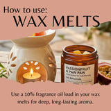 Instructional graphic titled 'How to use: WAX MELTS' showing a lit white wax warmer with a candle inside and an amber glass jar labeled 'PASSIONFRUIT & PAW PAW' beside it, with text explaining fragrance oil loading for wax melts.