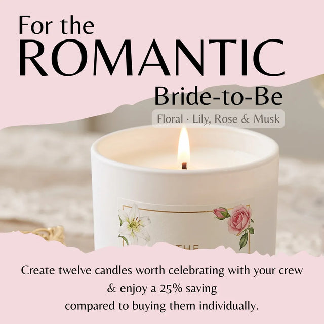A lit white candle with floral illustrations on the label, set against a soft pink promotional graphic with text reading 'For the ROMANTIC Bride-to-Be' and 'Floral · Lily, Rose & Musk.'.