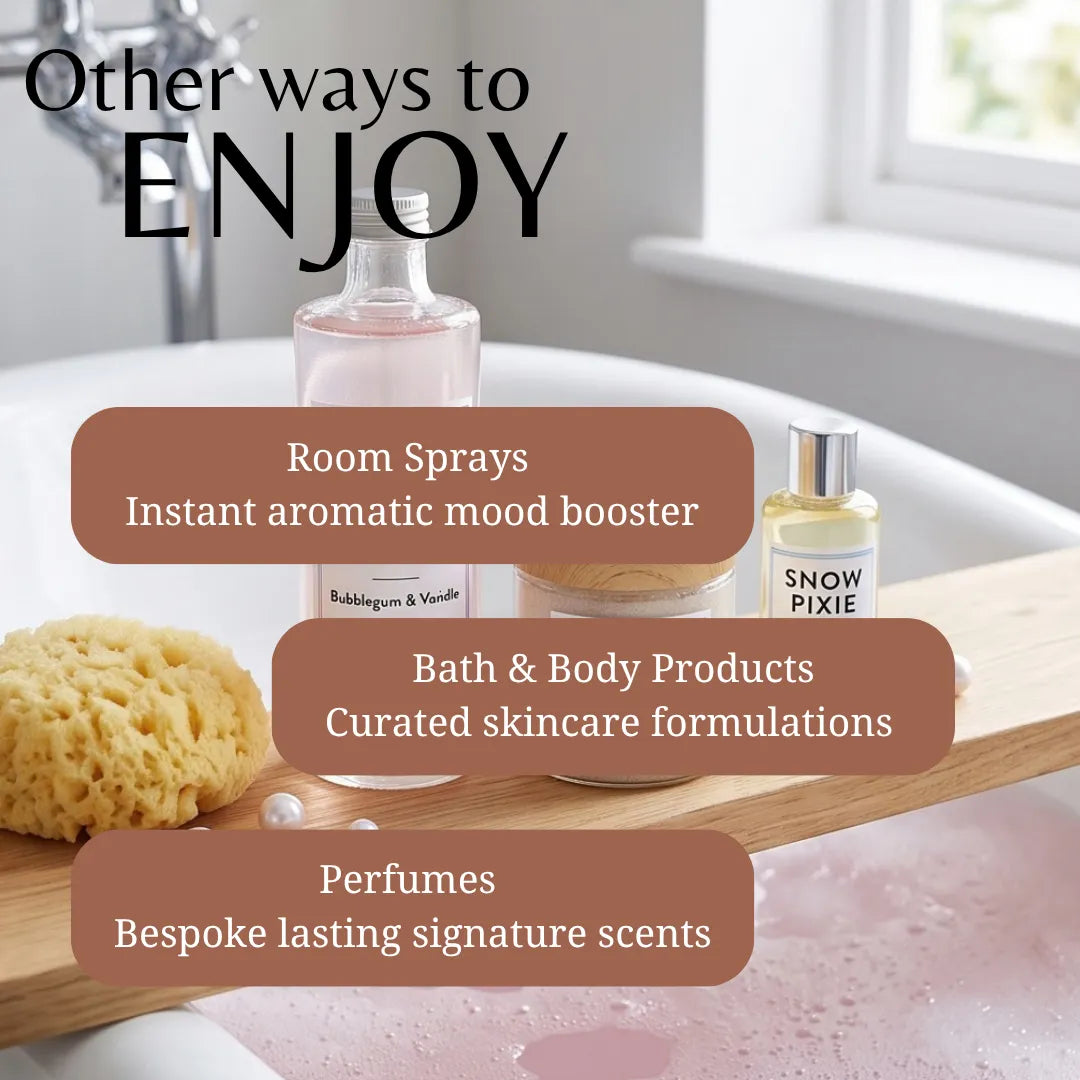 A promotional graphic showing bath and room fragrance products arranged on a wooden tray in a bathtub with bubbles. Text overlays read 'Other ways to ENJOY' and list categories: Room Sprays, Bath & Body Products, and Perfumes.