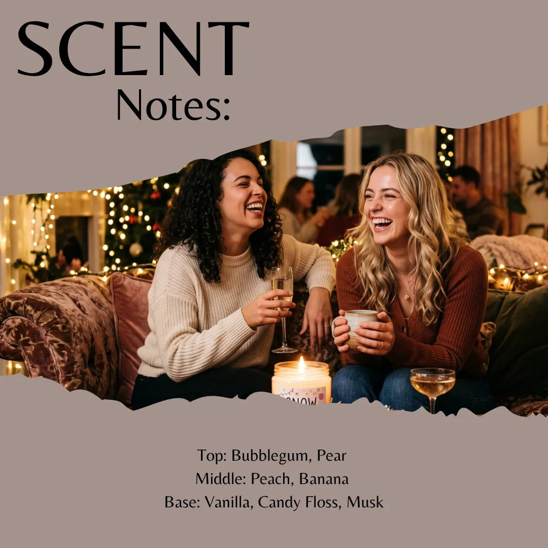 Scent Notes graphic for a holiday fragrance, featuring a warm lifestyle photo of two women laughing on a couch with a candle and drinks, with scent profile text listed below.