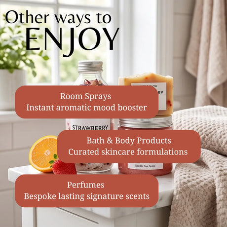 A promotional graphic showing several fragrance and bath/body product containers on a white table in a bright bathroom setting, with large text reading 'Other ways to ENJOY' and callout bubbles describing room sprays, bath & body products, and perfumes.