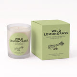 A Wild Lemongrass fragrance oil candle in a frosted glass jar next to its light green cardboard packaging box, on a clean white background.