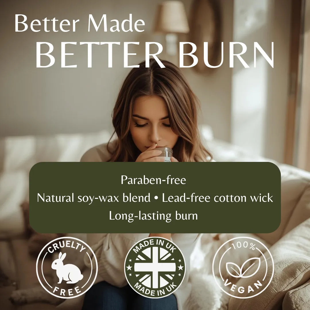 A woman sits on a sofa in a softly lit living room, holding a glass. Large text at the top reads 'Better Made BETTER BURN,' with a dark olive badge below listing product benefits: 'Paraben-free, Natural soy-wax blend, Lead-free cotton wick, Long-lasting burn.